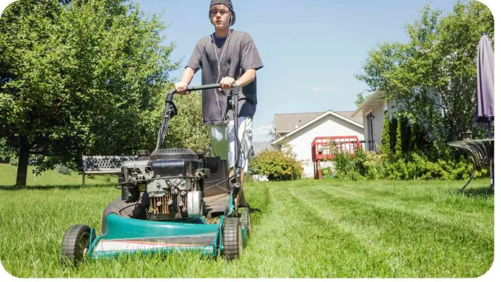 a person is mowing the lawn with a lawn mower