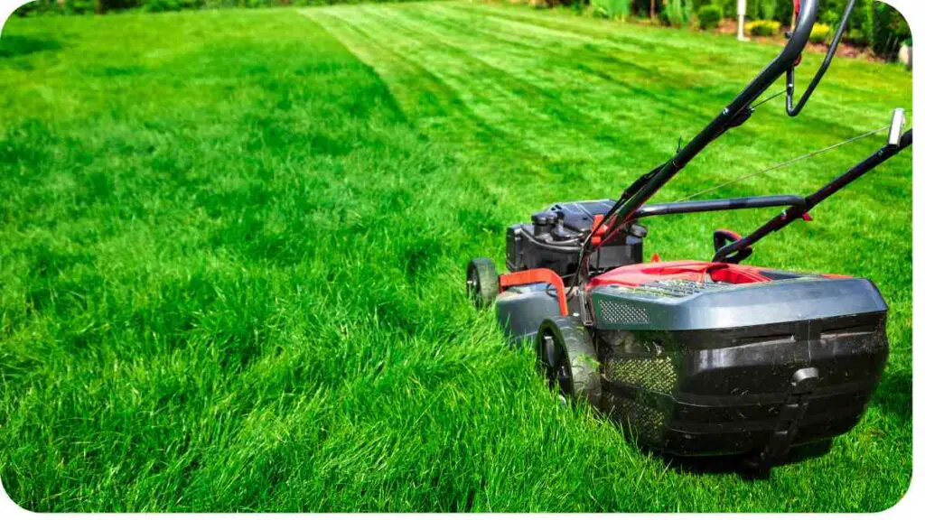 a lawn mower is cutting grass in the middle of a green field