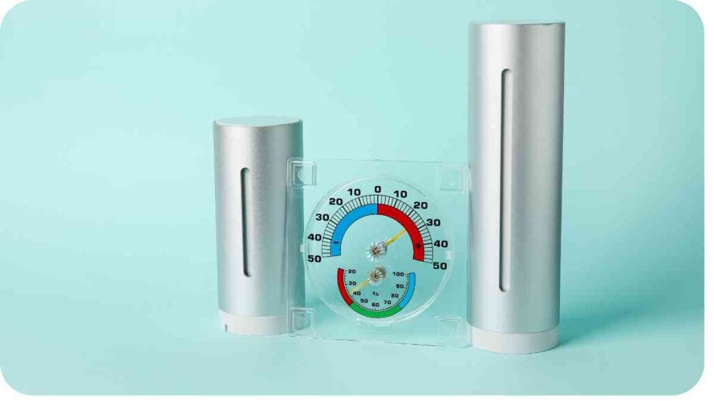 a thermometer and a thermometer stand on a blue background