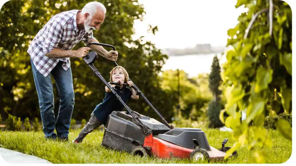 an older person pushing a child on a lawn mower