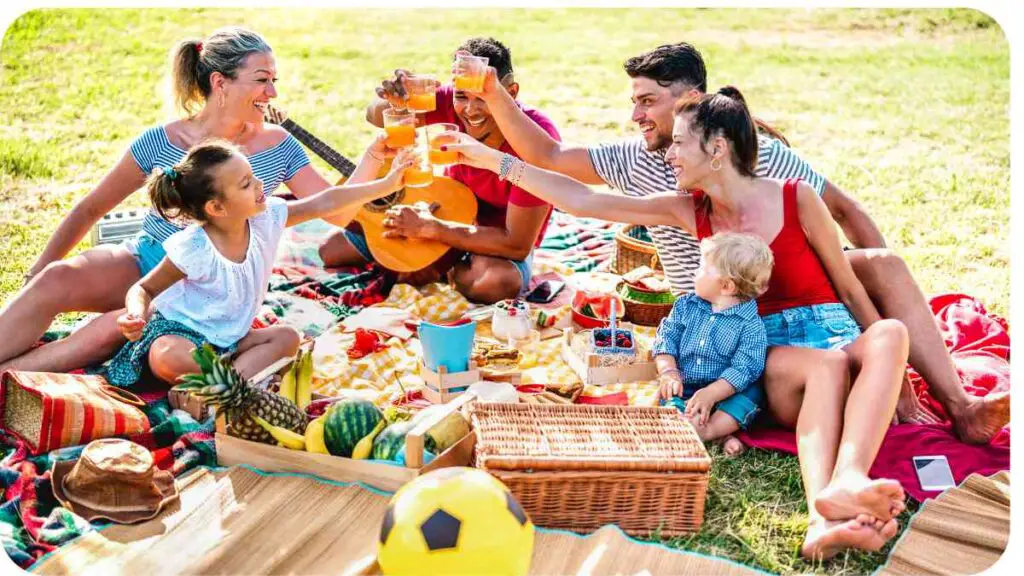 a group of people having a picnic in the park