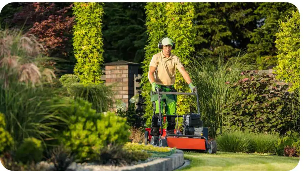 a person is mowing the lawn with a lawn mower