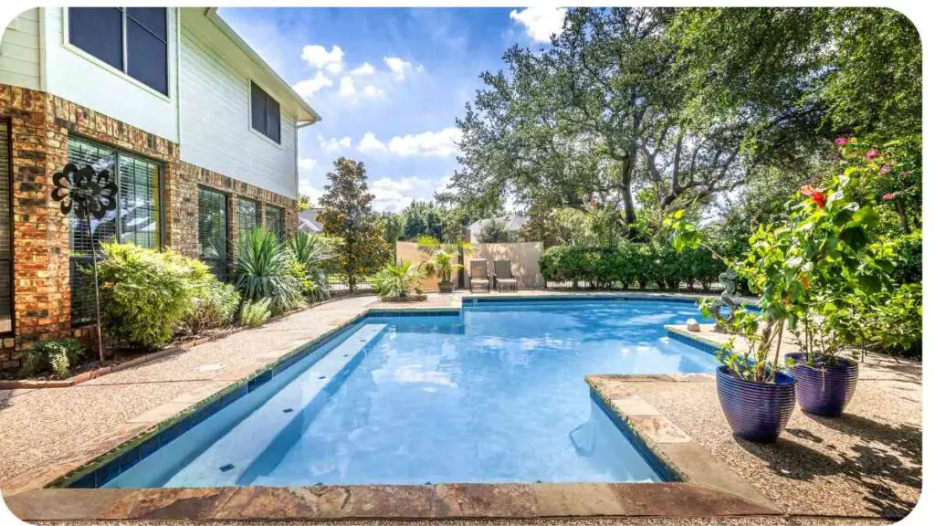 an outdoor swimming pool in a backyard